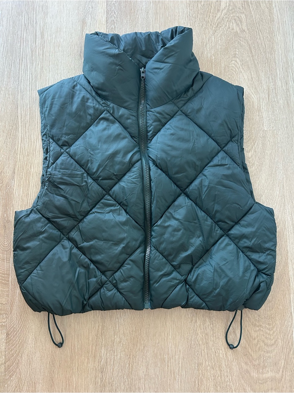 Harlow Quilted Sleeveless Puffer Vest in Dark Green